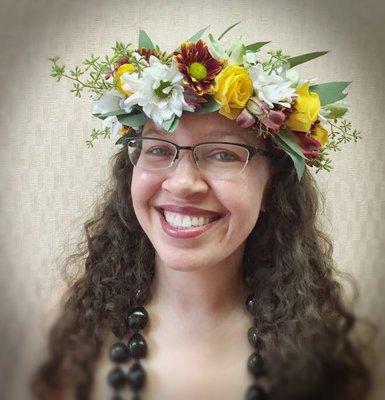 Clare with her first head lei that she made.