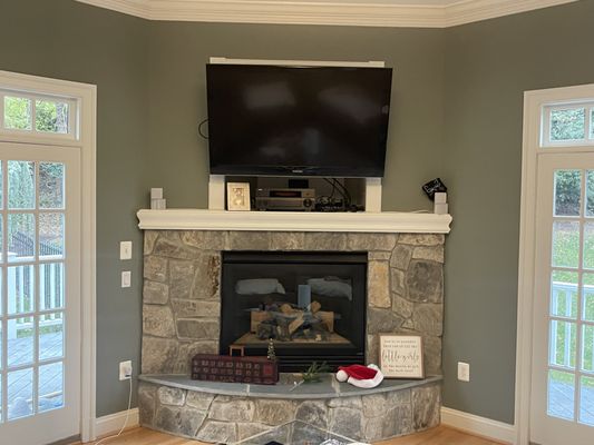 Stone veneer fireplace