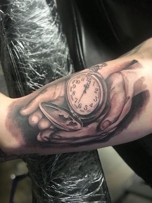 Black and grey time piece