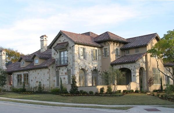 Italian Home with Front Courtyard by The Holmes Builders