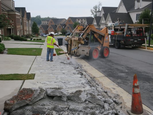 Demo of sidewalk in McLean