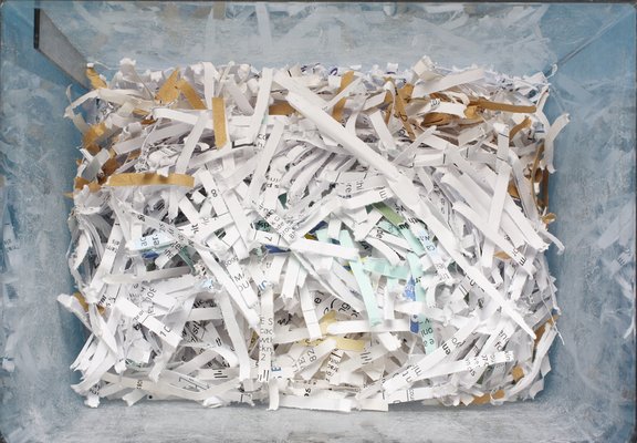 Bin of shredded paper