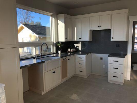 Don't be afraid to use Sequel Encore Pietra Grey quartz as a countertop and backsplash. It's really beautiful.