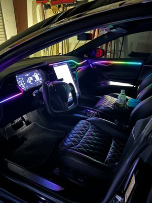 Tesla Model 3 with LED Color chasing lights on the dash, doors, and behind the seats