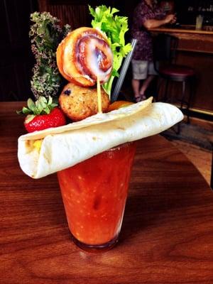 Sunday Funday. Breakfast Bloody Mary w/ breakfast burrito, blueberry muffin, cinnamon bun, strawberry, orange, and veggies.