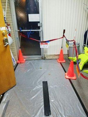 Signs and barriers, used to keep people out of the work area