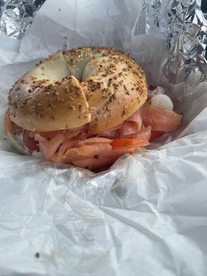 Garlic bagel with lox and cream cheese