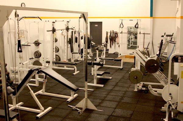 Our large weight room provides the options of free weights and machines