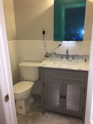 Vanity/sink/ medicine cabinet installation.