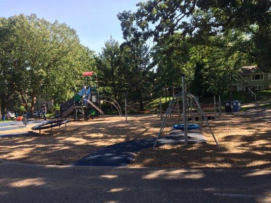 Checking out a new park this morning- great new equipment and mostly shaded with trees.