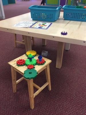 The activity tables were all too tall for my toddler, so I had to put things on a bench, on the floor or hold him up.