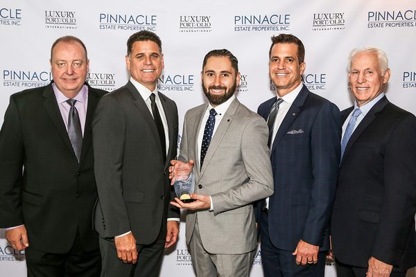 2017 Pinnacle Awards banquet. Receiving the prestigious Platinum Award for production over 10 Million dollars.