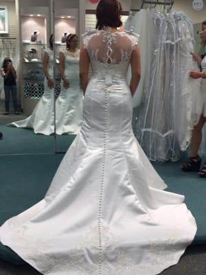 The back of the dress completely won me over, love the buttons all the way to the tail.