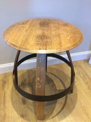 Custom table from wine barrel parts.