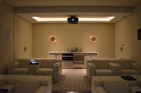 Custom Home Theater controlled by Savant. Sony 4K projector, custom theater seating by CinemaTech