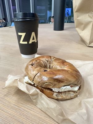 Cinnamon Raisin bagel with cream cheese and vanilla latte