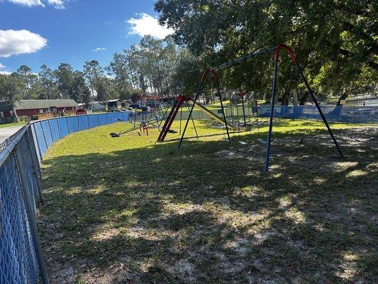 Fenced playground for the youngsters