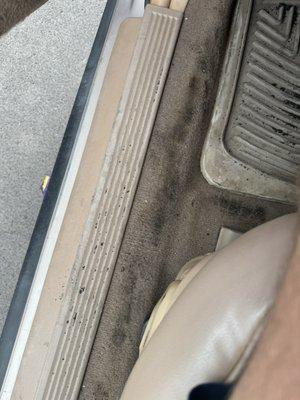 All grease and stains in this carpet were the result of the service techs. There were no stains in this sedan at the time of drop off.