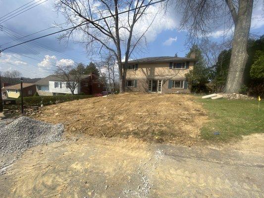 complete failure to properly back fill the clay into the linear plumbing line, thereby killing the grass and spread clay and rocks all over.