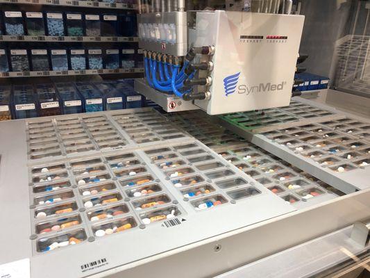 Our two robots help package multidose and single dose medications as accurately as possible with barcode scans at every step