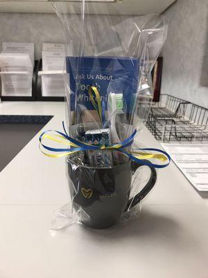 Lovely coffee mug filled with goodies as a thank you