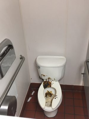 Disgusting toilet, dried up poop! Come Pizza Hut!