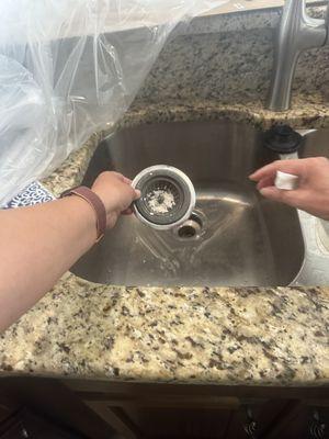 Drywall materials we are cleaning out of our sink on day one