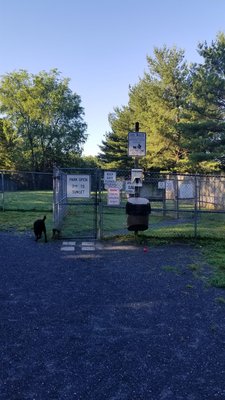 Entrance to large grassy area, which is in the back