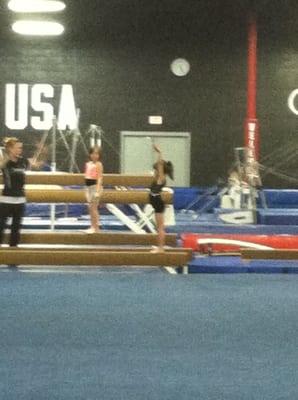 6 year old on balance beam at Jeurgen's Gymnastics