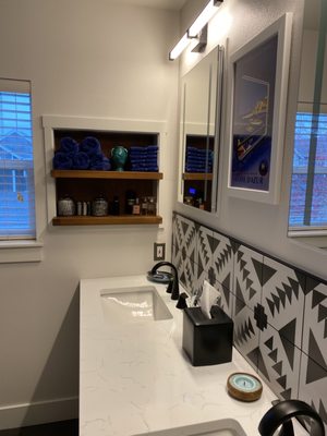 Master bath vanity, backsplash and built in shelves.