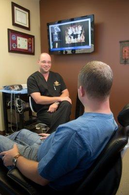 Dr. James Mazock with a patient