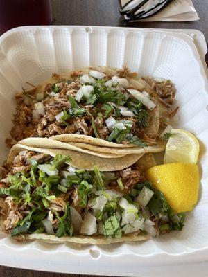 Two delicious porky tacos.  Very succulent on the lips.