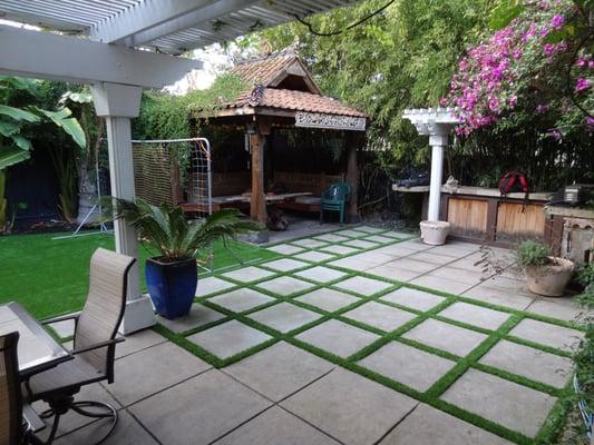 Artificial grass installed in the entire backyard and side yard. Also in between separated stone pavers in Cupertino, California