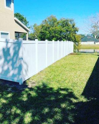 6' white vinyl privacy , residential backyard