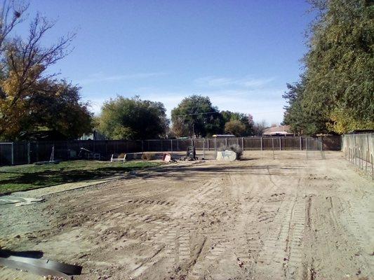 My yard after the dirt mountain was removed and leveled by Pave Hawk