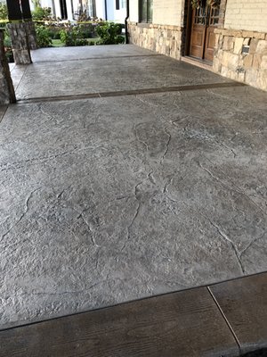 Stamped concrete overlay on top of existing concrete.