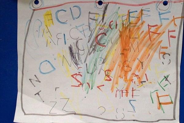 Sophie, age 3, is learning to write her letters.