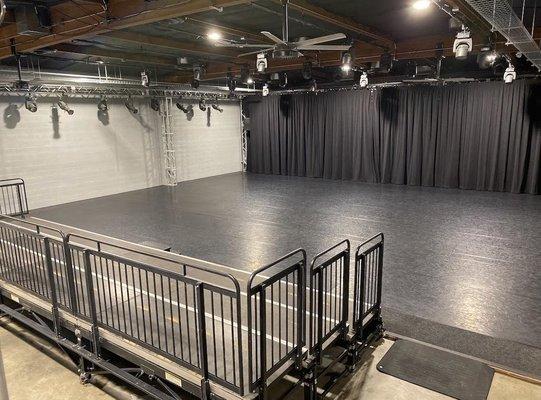 Warehouse Space
 Theatrical Lighting and Sound
 Black curtain along back wall
 Widescreen T.V.