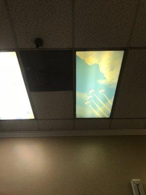 You sit on the dentist's chair and look up. You will see amazing tiles which will relax you while you are doing your dentistry.