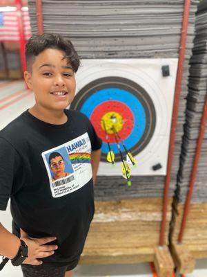 My son with his 1st set of arrows out of his new mission bow tuned by Evan.