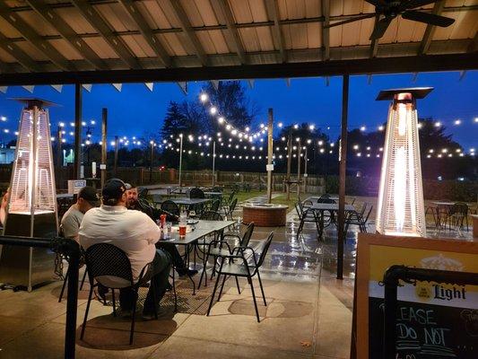 Raining but their only seating under the awnings.