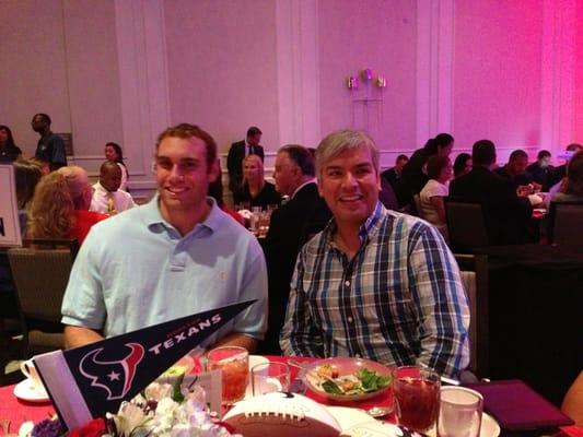 Texans player Mike Mohamed #49 at Massage Innovation's table.