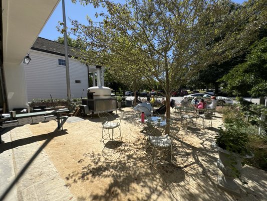 Outdoor seating area and pizza oven