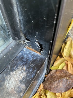 Side of window frame after the "repair" of the rusted holes.