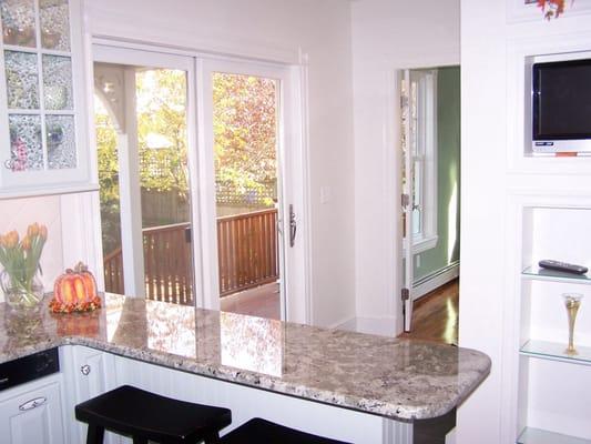 Marblehead Kitchen, View over pennisula through new sliding door.