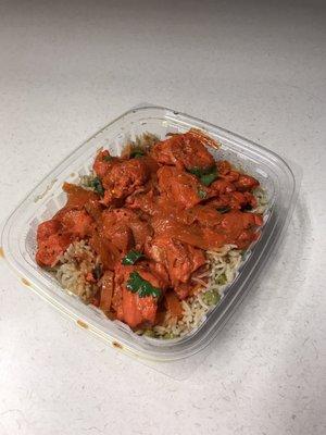 Chicken tiki masala over rice