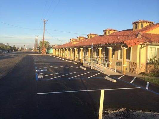 Traveler's Inn - The goal of this job was to minimize puddles and standing water from rain and landscape sprinklers.