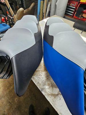 Prefabricated covers for two jet skis.  All we had to do was peel the old ones and installed the new ones.  New covers provided by customer.