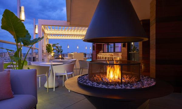 Hotel Zena rooftop bar and fireplace