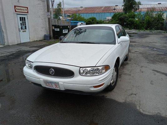 My car on Lilly Street next to former junkyard